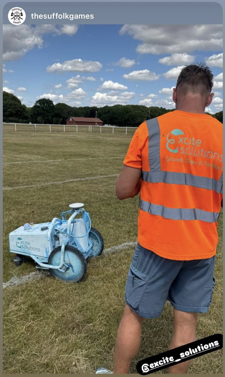Excite Solutions marking out the lines for The Suffolk Games at Trinity Park, Ipswich, Suffolk using Reggie the robot line marker.